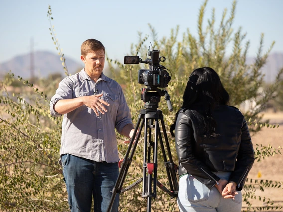 SAES Director Brett Blum takes media interviews at an event for the Smart Trees research program at CAC.