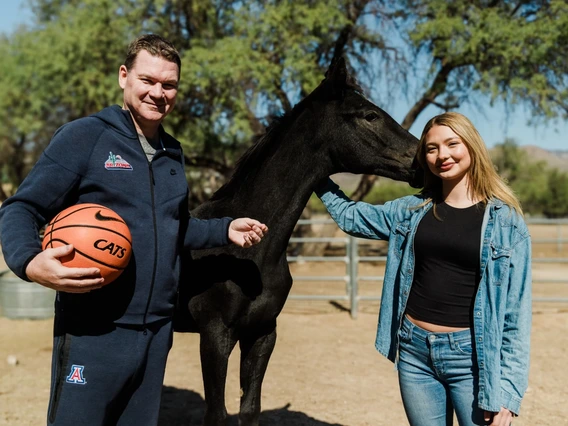 Coach Tommy Lloyd, head coach for Arizona Men's Basketball, meets Coach Lloyd's Legacy - a weanling horse named in his honor and raised at the Al-Marah Equine Center.