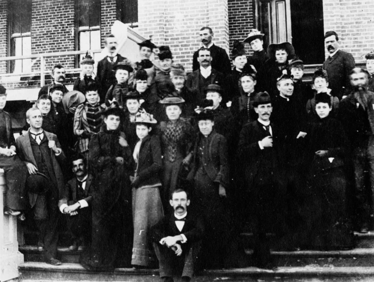 Faculty gathered on the steps of UA's Old Main building