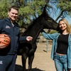 Coach Tommy Lloyd, head coach for Arizona Men's Basketball, meets Coach Lloyd's Legacy - a weanling horse named in his honor and raised at the Al-Marah Equine Center.